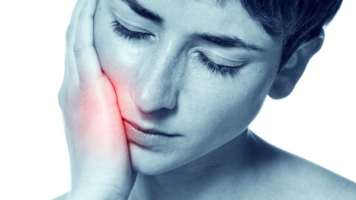 علائم عفونت ایمپلنت دندان چیست؟
